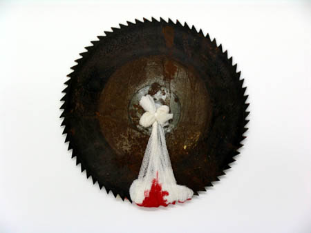 Verletzte Arbeitsgeräte (Sägeblatt)